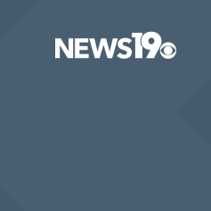 Logo of NEWS19 on a blue background